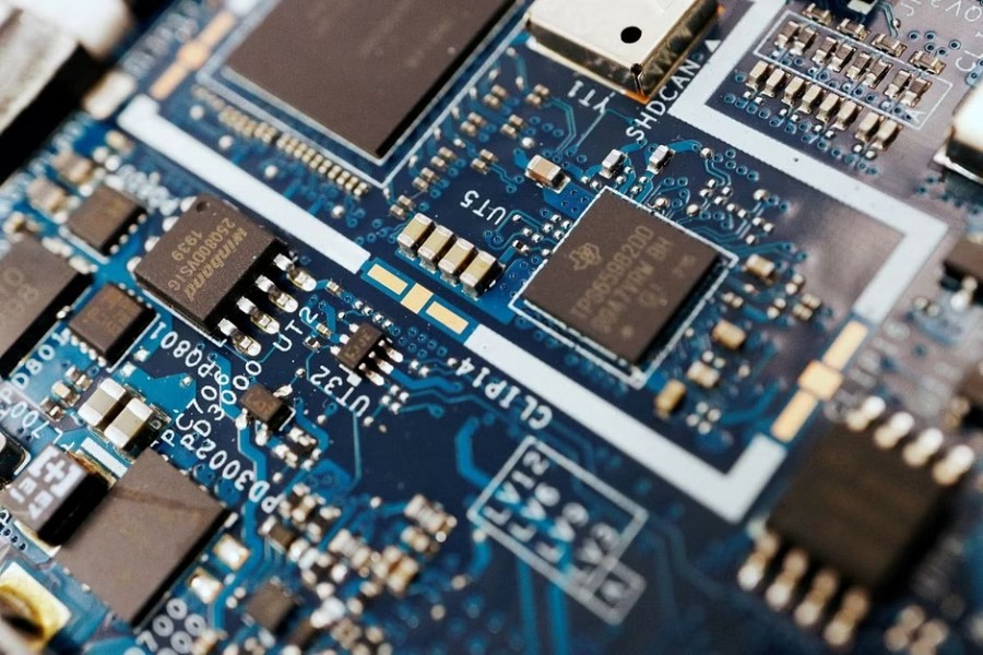 Semiconductor chips are seen on a circuit board of a computer in this illustration picture taken February 25, 2022. REUTERS