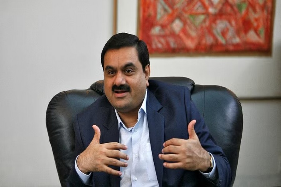 FILE PHOTO: Indian billionaire Gautam Adani speaks during an interview in the western Indian city of Ahmedabad, Sept 24, 2012.REUTERS