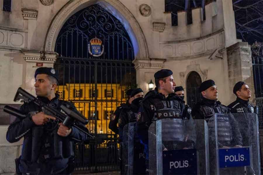 Riot police officers securing the entrance of the Consulate General of Sweden in Istanbul during a demonstration recently -Reuters file photo