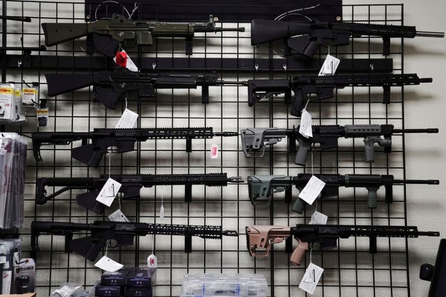AR-15 style rifles are displayed for sale at Firearms Unknown, a gun store in Oceanside, California, U.S., April 12, 2021. REUTERS/Bing Guan