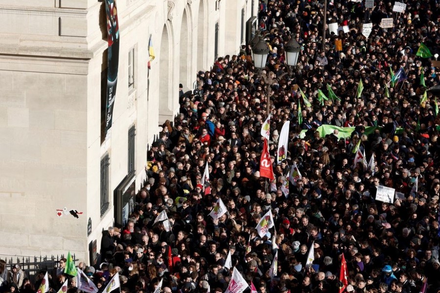 A general view shows protesters, members of French Socialist party and members of the EELV ecologist party gathering at Place d'Italie during a demonstration against French government's pension reform plan in Paris as part of a day of national strike and protests in France, January 31, 2023. REUTERS/Benoit Tessier