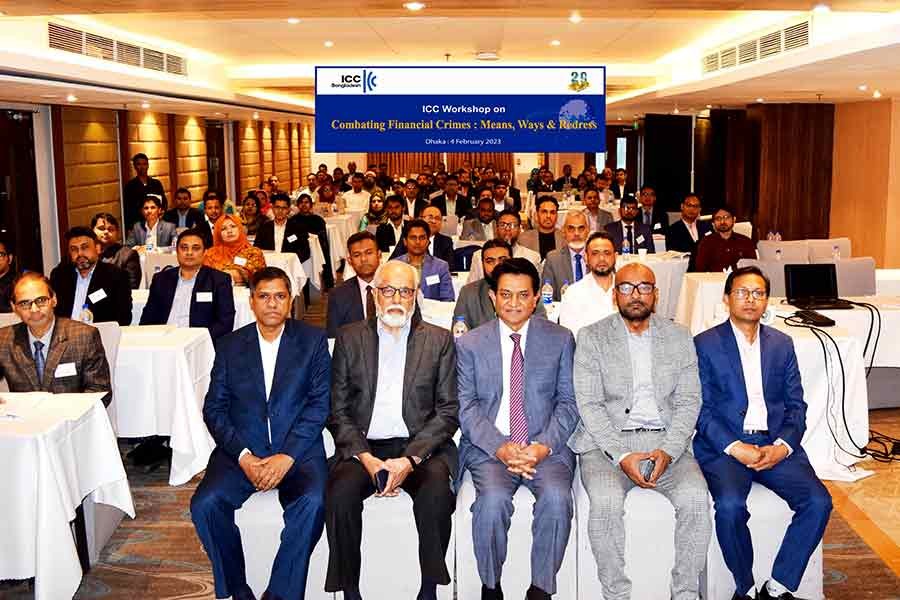 Guests and participants posing for photograph during a day-long workshop on ‘Combating Financial Crimes: Means, Ways & Redress’ organised by ICC Bangladesh at a city hotel on Saturday