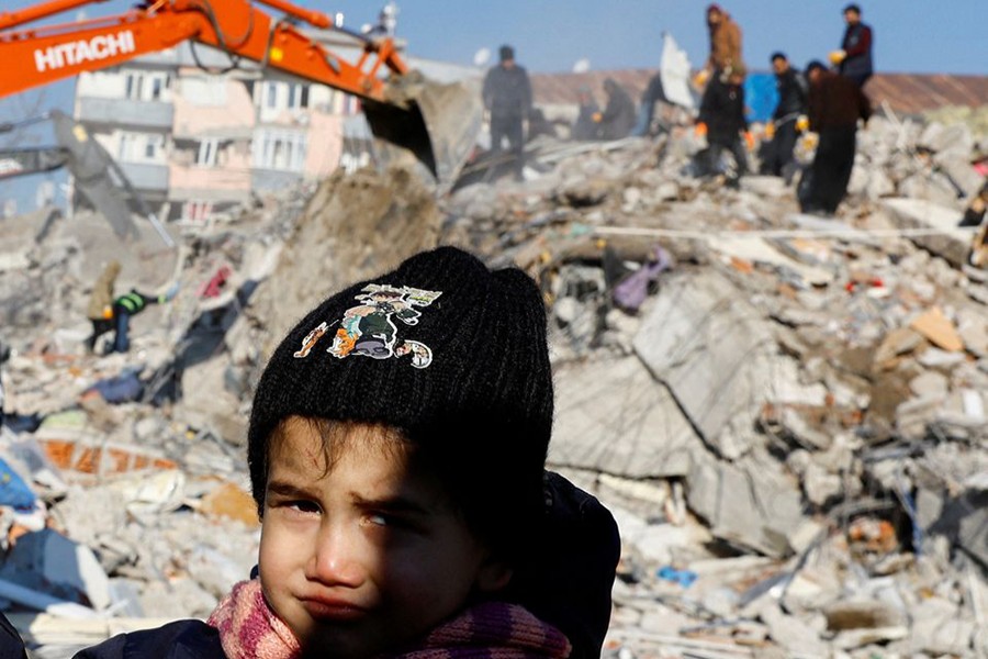 A child looks on in the aftermath of a deadly earthquake in Kahramanmaras, Turkey on February 8, 2023 — Reuters photo