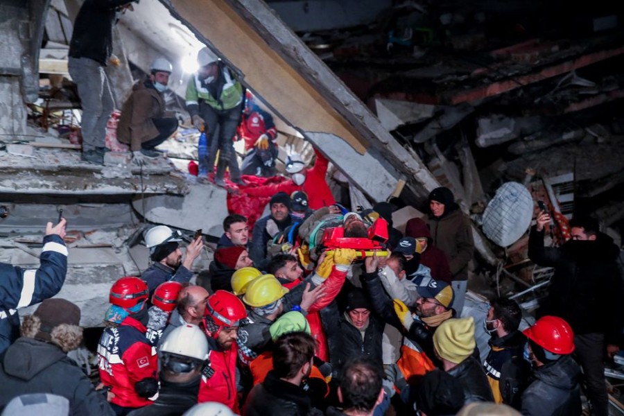 Rescuers carry out a person from the rubble, as the search for survivors continues, in the aftermath of a deadly earthquake, in Hatay, Turkey on February 10, 2023 — Reuters photo