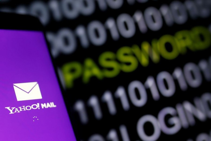 Yahoo Mail logo is displayed on a smartphone's screen in front of a code in this illustration taken in October 6, 2016 — Reuters/Files