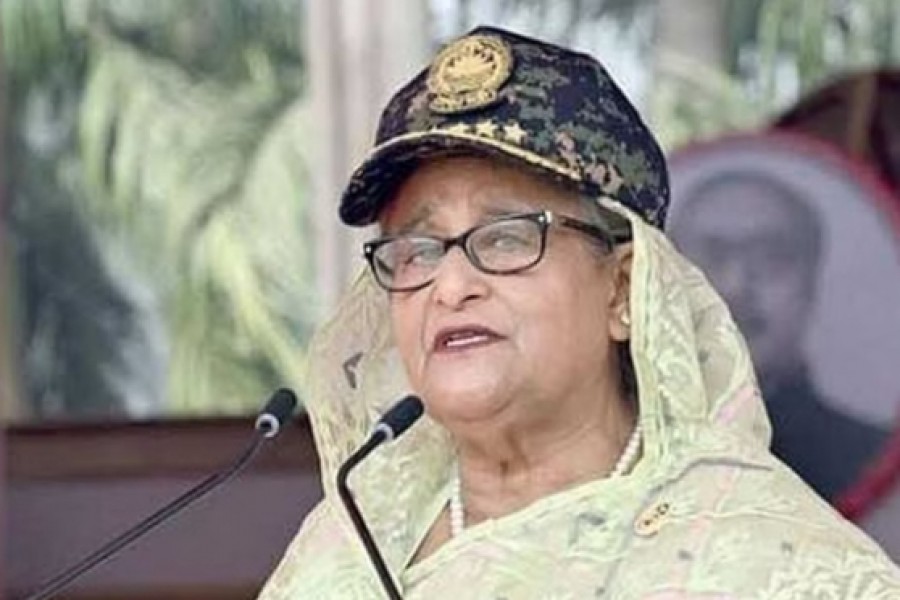 Prime Minister Sheikh Hasina addresses the 43rd National Assembly of Ansar and VDP at Gazipur’s Shafipur on Sunday, Feb 12, 2023. Photo: BSS