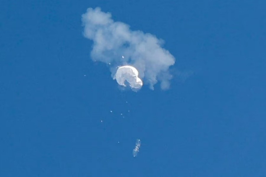 The suspected Chinese spy balloon drifts to the ocean after being shot down off the coast in Surfside Beach, South Carolina, US on February 4, 2023 — Reuters/Files