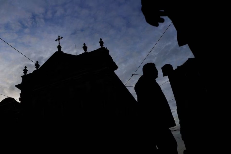 People walk by a church on the day Portugal's commission investigating allegations of historical child sexual abuse by members of the Portuguese Catholic church will unveil its report, in Lisbon, Portugal on February 13, 2023 — Reuters photo
