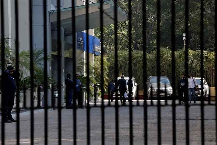 Private security guards are seen outside a building having BBC offices, where income tax officials are conducting a search, in New Delhi on Wednesday –Reuters file photo