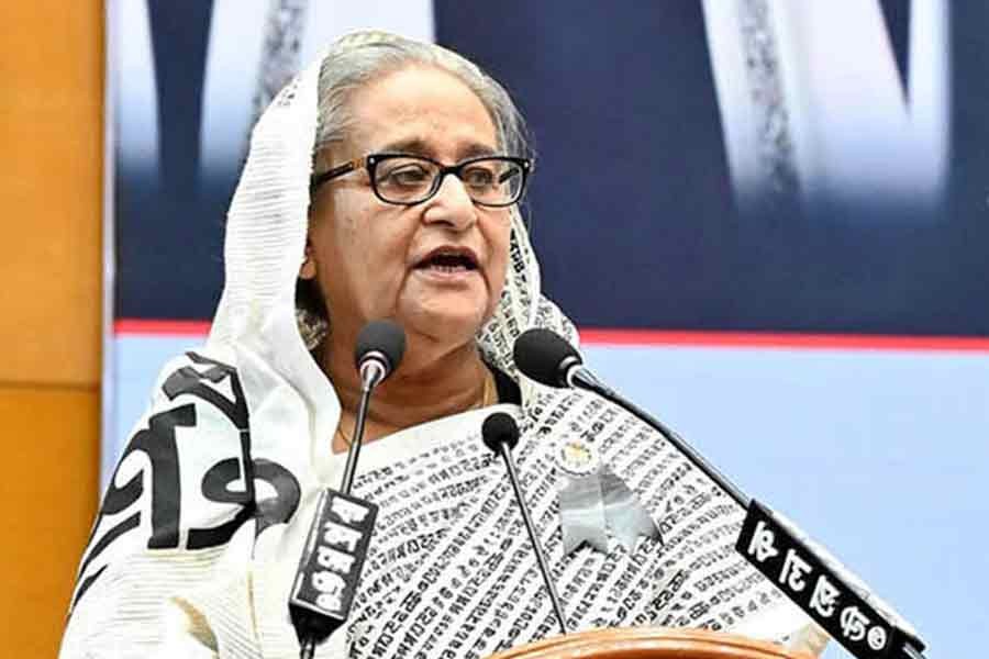 Prime Minister Sheikh Hasina addressing a discussion marking the International Mother Language Day, organised by the Awami League, at the Bangabandhu International Conference Centre (BICC) in the capital on Wednesday –PID Photo