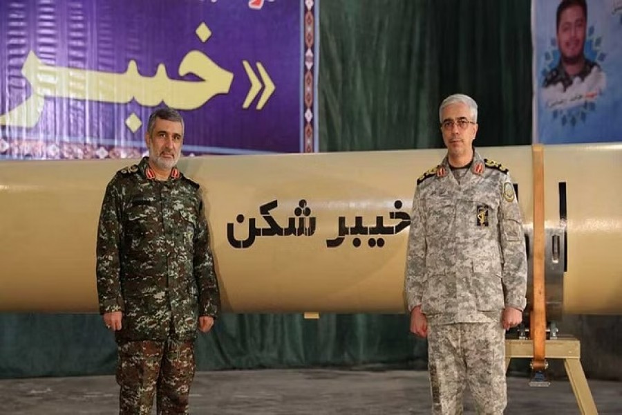 Iranian Armed Forces Chief of Staff Major General Mohammad Bagheri and IRGC Aerospace Force Commander Amir Ali Hajizadeh stand together during the unveiling of "Kheibarshekan" missile at an undisclosed location in Iran, in this picture obtained on February 9, 2022. IRGC/WANA (West Asia News Agency)/Handout via REUTERS