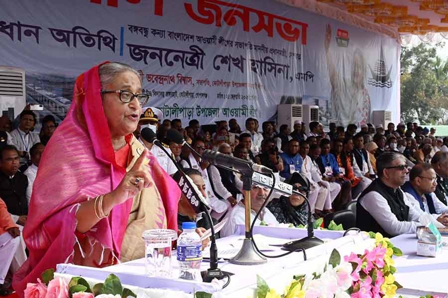 Prime Minister and Awami League (AL) President Sheikh Hasina addressing a grand rally at the Talimpur Telihati High School ground in Sadullapur Union of Kotalipara upazila in Gopalganj on Saturday -PID Photo