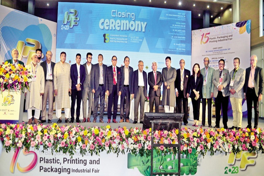 PLASTIC, PRINTING AND PACKAGING INDUSTRIAL FAIR ENDS: Participants pose at the closing ceremony of the 15th Plastic, Printing and Packaging Industrial Fair held at the International Convention City Bashundhara in the capital on Saturday.
